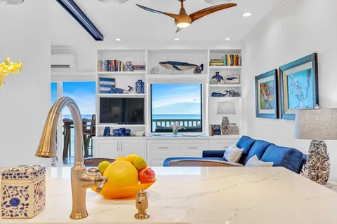 a bedroom with furniture and a flat screen tv