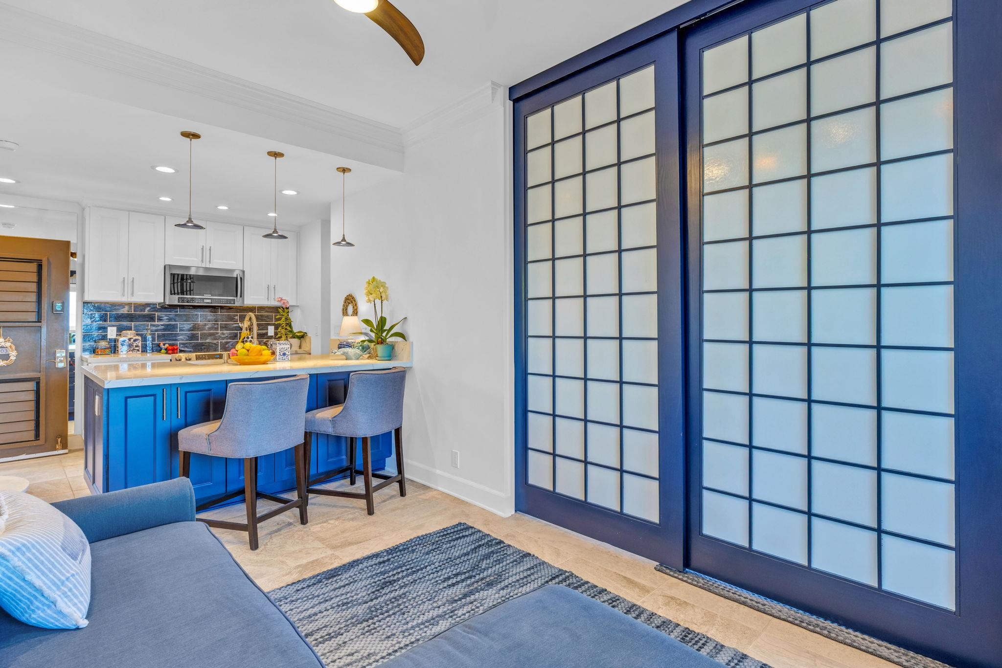 4435 Lower Honoapiilani Road, Unit 203 Lahaina, HI 96761 - Photo 18 of 32 a outdoor dining space with furniture and a potted plant