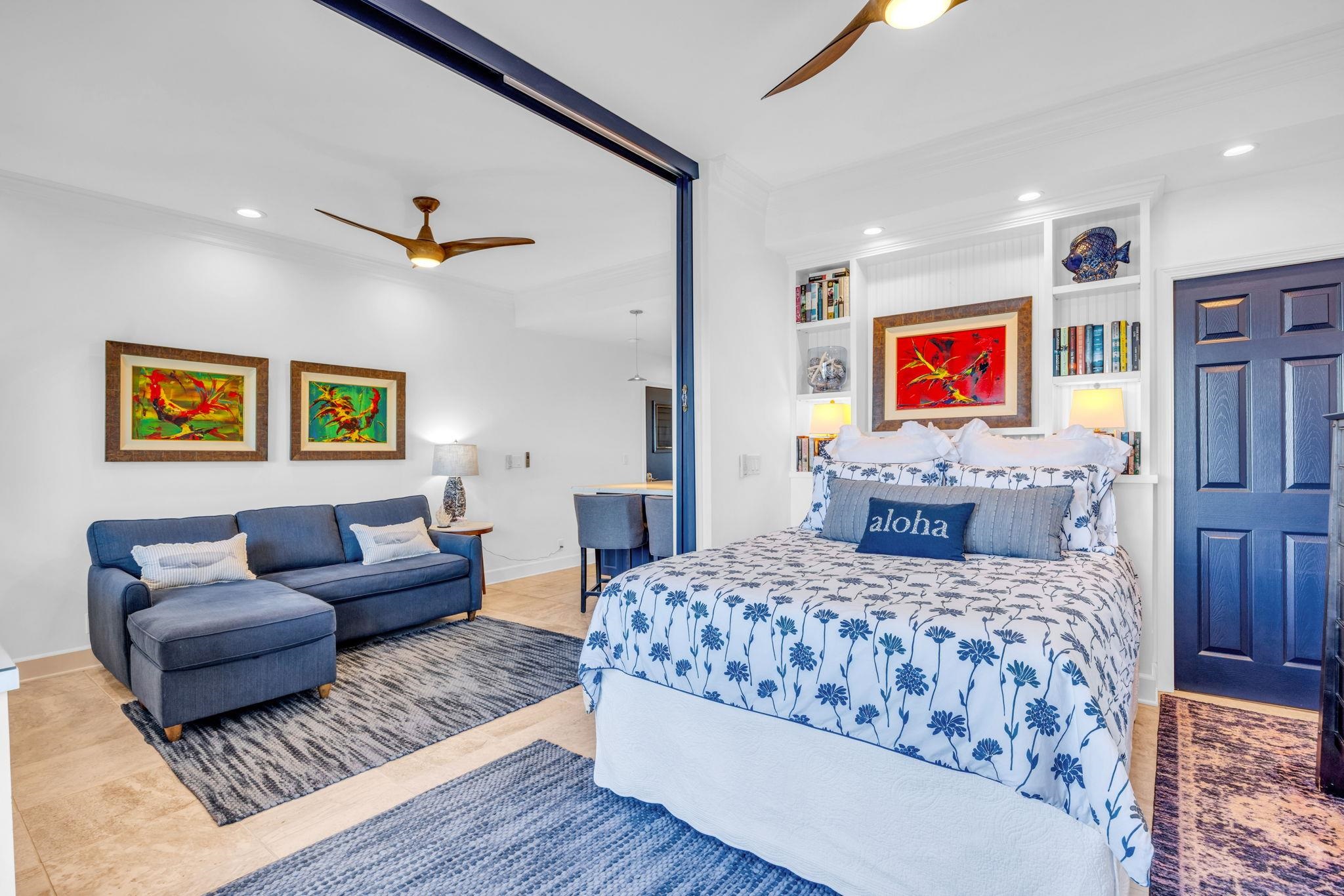 4435 Lower Honoapiilani Road, Unit 203 Lahaina, HI 96761 - Photo 23 of 32 a bedroom with a bed and furniture