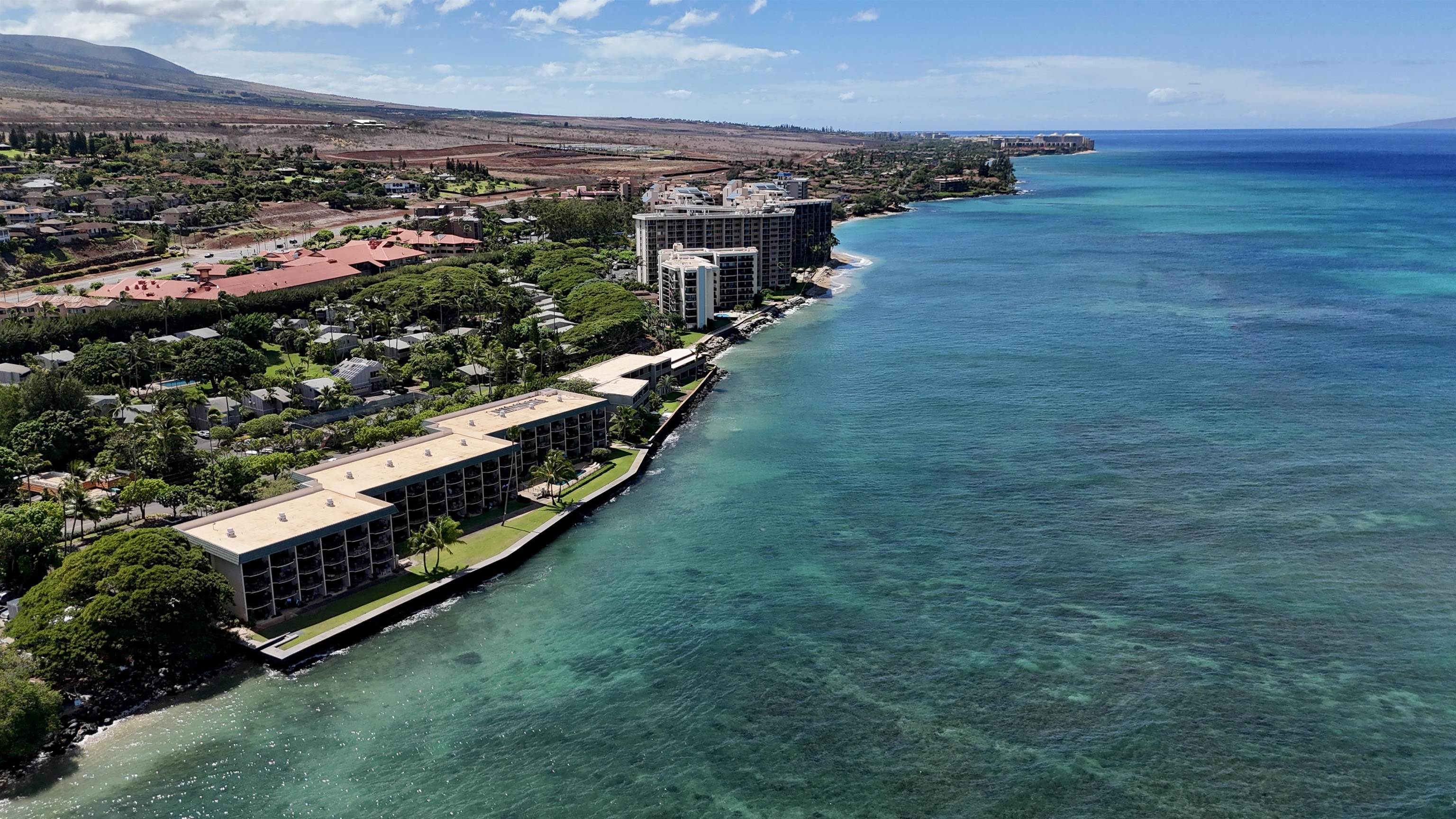 4435 Lower Honoapiilani Road, Unit 203 Lahaina, HI 96761 - Photo 29 of 32 an aerial view of multiple house