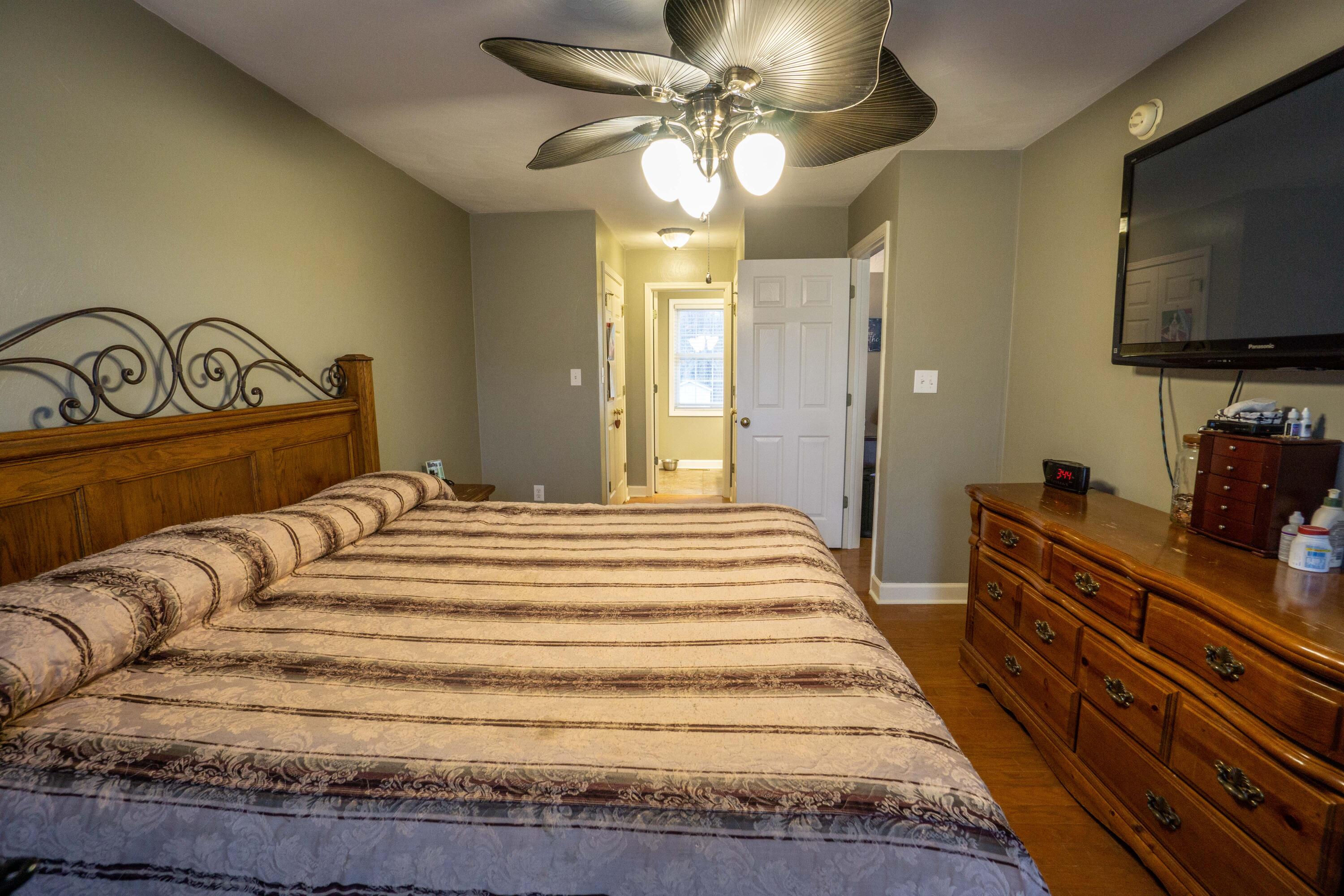 1708 Meadows Road Vinton, VA 24179 - Photo 14 of 31 a bedroom with a bed and a flat screen tv