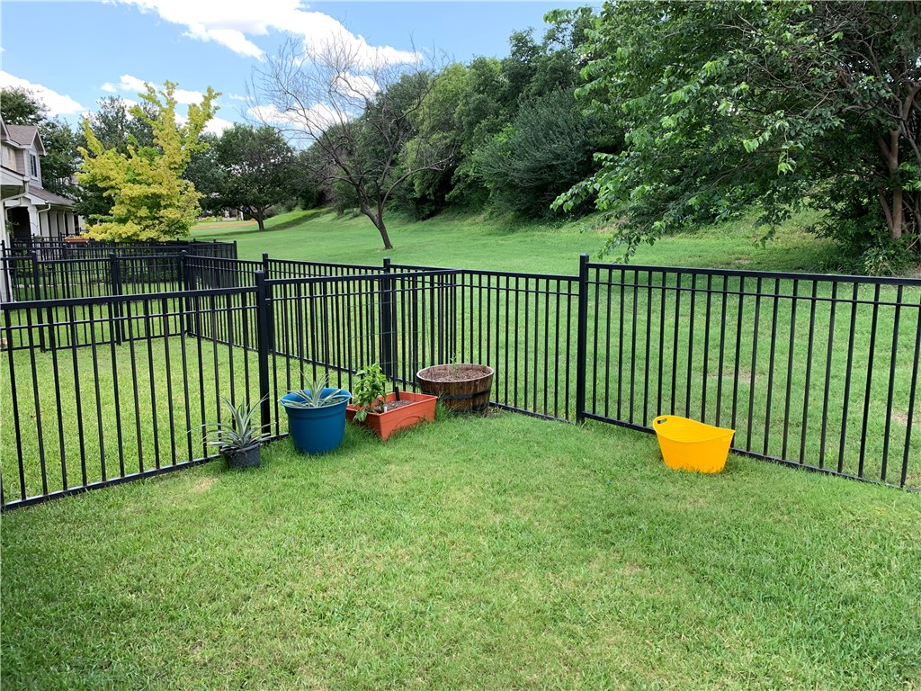 1900 Scofield Ridge Parkway, Unit 1202 Austin, TX 78727 - Photo 1 of 18 Private greenbelt view from back porch