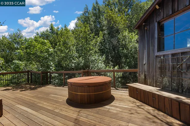 a kitchen with a stove a sink and a cabinets