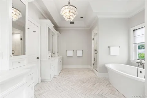 a bathroom with a sink vanity and a mirror
