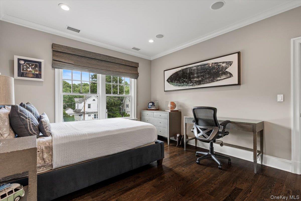 81 Wappanocca Avenue Rye, NY 10580 - Photo 15 of 27 Bedroom featuring wood finished floors, crown molding, and recessed lighting
