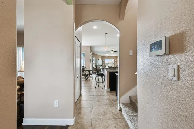 a living room with furniture window and wooden floor