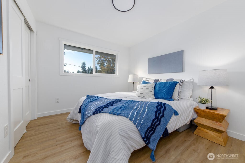 1103 Vashon Court Northeast Renton, WA 98059 - Photo 13 of 26 a bedroom with bed and window