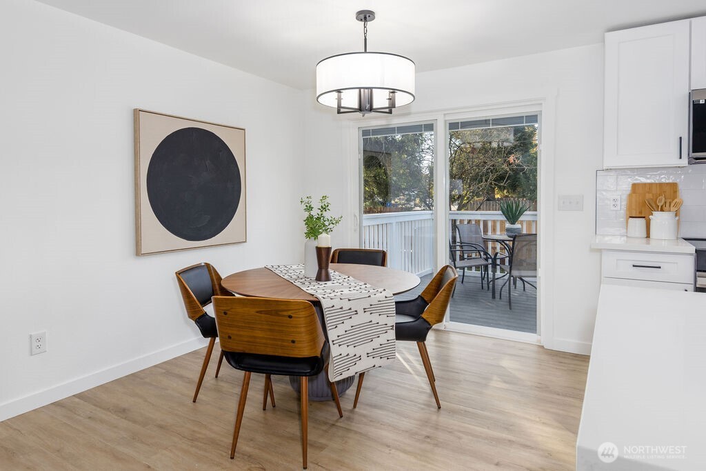 1103 Vashon Court Northeast Renton, WA 98059 - Photo 9 of 26 a dining room with furniture and window
