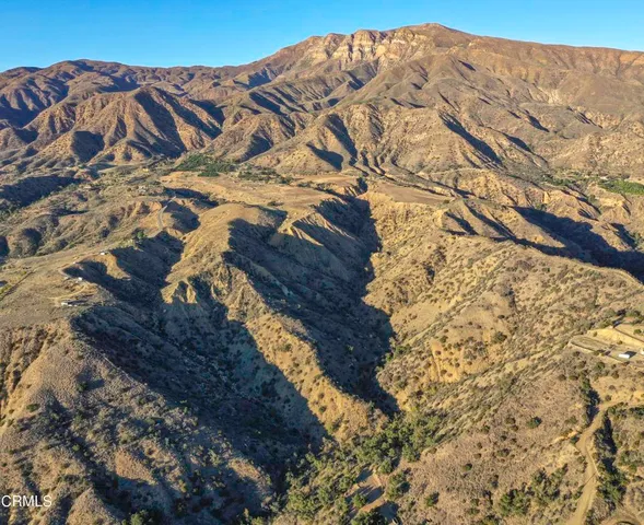 a view of mountain with lake