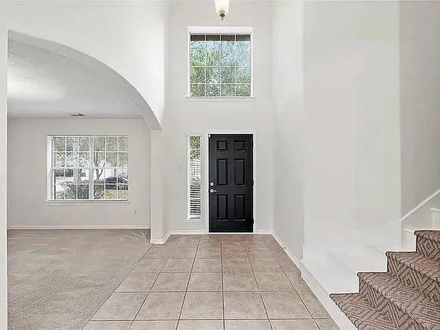 an empty room with windows