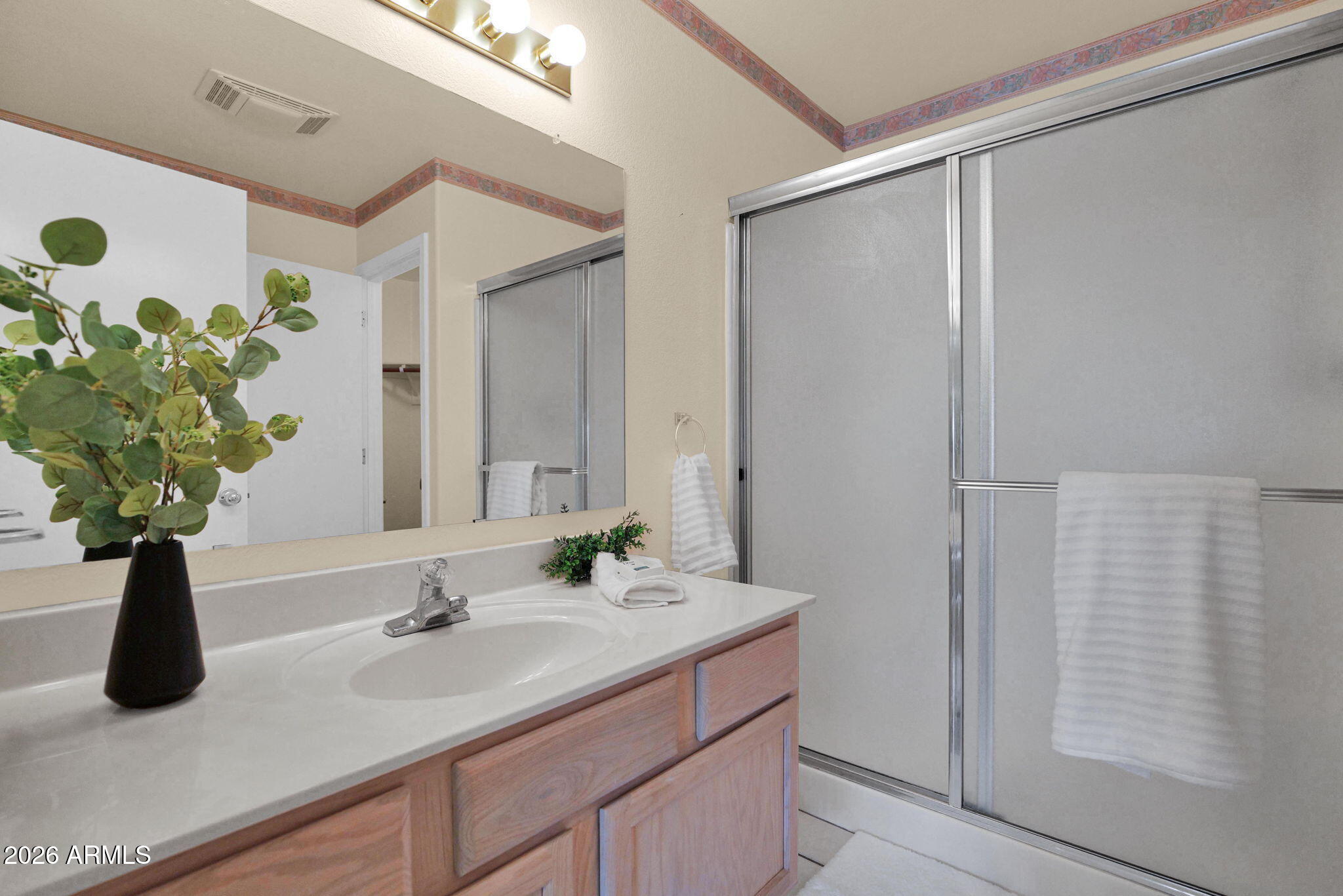 5808 East Brown Road, Unit 36 Mesa, AZ 85205 - Photo 19 of 29 a bathroom with a double vanity sink and a mirror