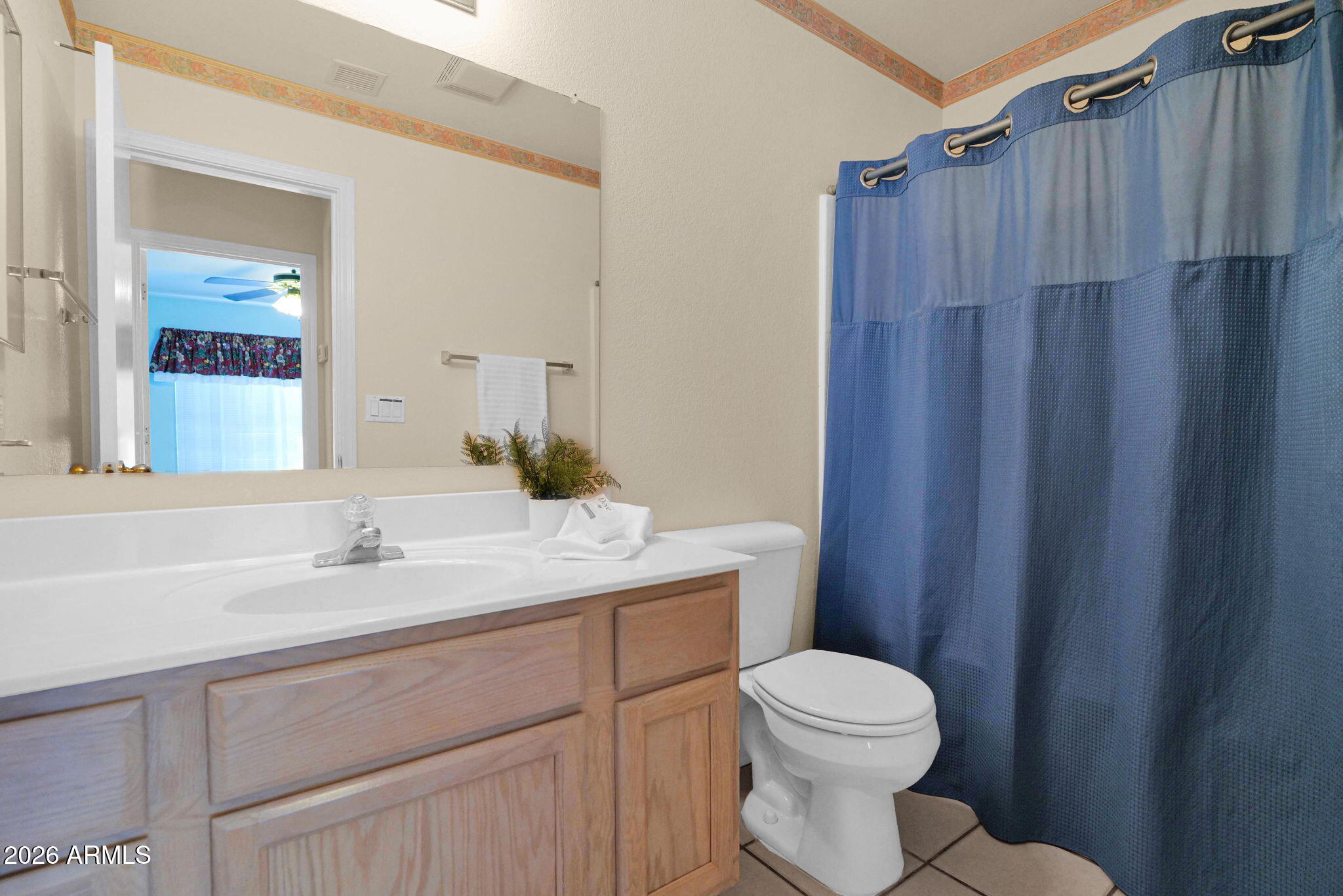 5808 East Brown Road, Unit 36 Mesa, AZ 85205 - Photo 23 of 29 a bathroom with a sink a toilet and shower