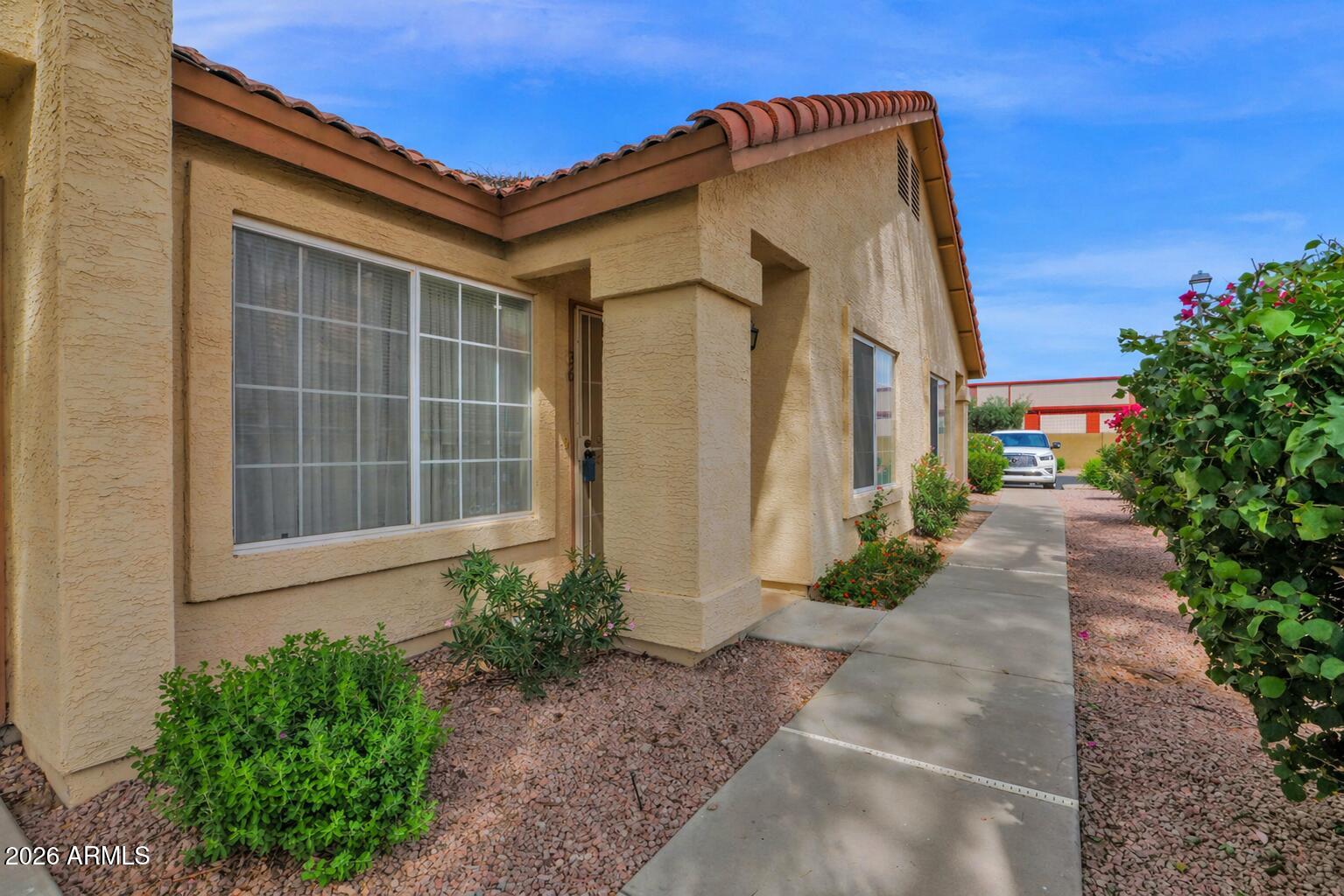 5808 East Brown Road, Unit 36 Mesa, AZ 85205 - Photo 27 of 29 a front view of a house
