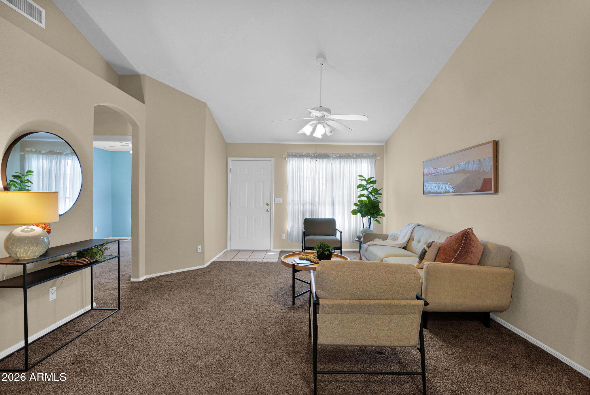 5808 East Brown Road, Unit 36 Mesa, AZ 85205 - Photo 3 of 29 a living room with furniture wooden floor and a chandelier