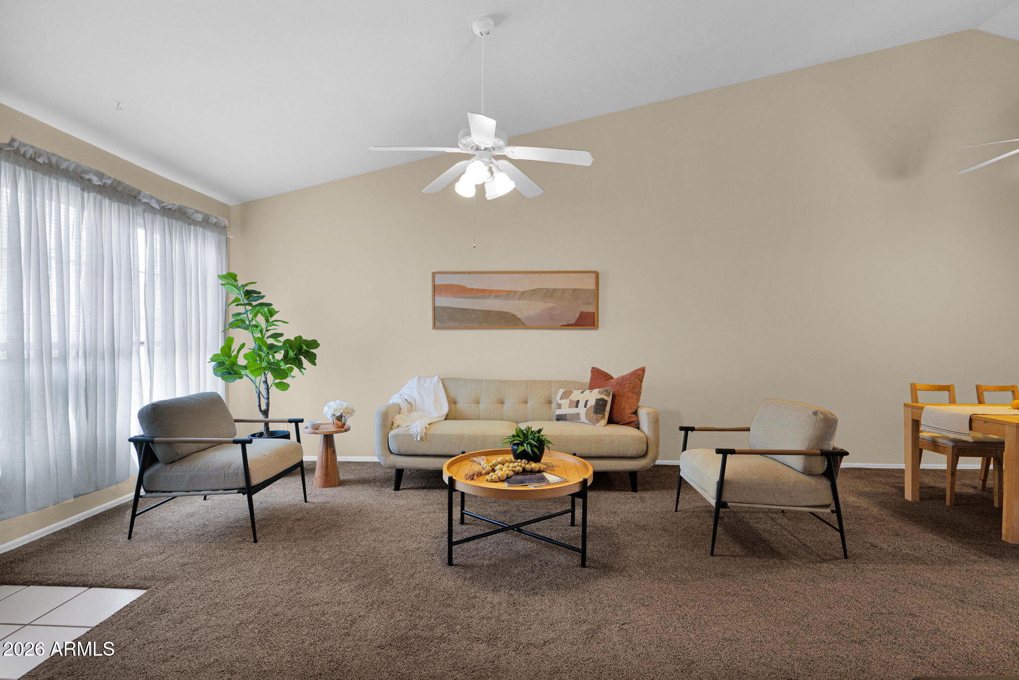 5808 East Brown Road, Unit 36 Mesa, AZ 85205 - Photo 5 of 29 a living room with furniture and a chandelier