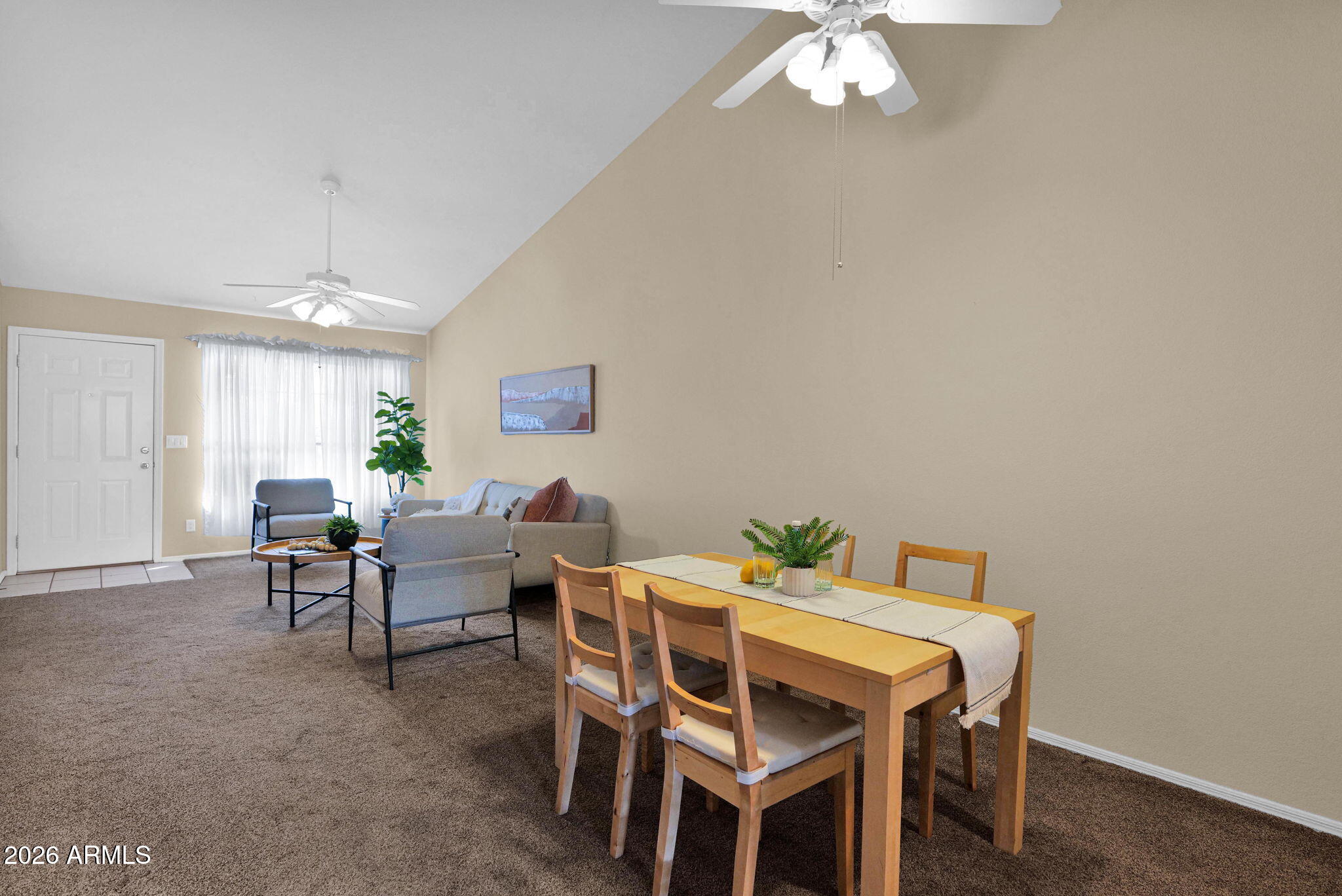 5808 East Brown Road, Unit 36 Mesa, AZ 85205 - Photo 7 of 29 a dining room with furniture and window