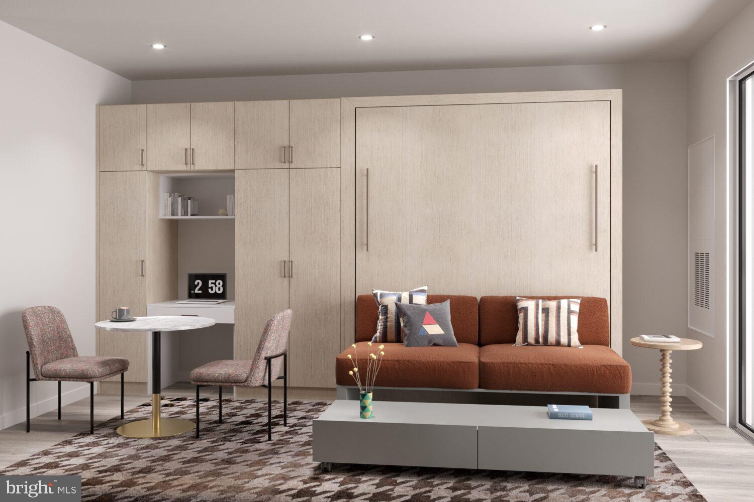 a living room with furniture and a rug