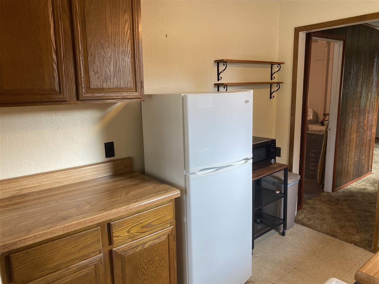 10979 2nd Street Roscoe, IL 61073 - Photo 15 of 30 a view of a storage and utility room with washer and dryer