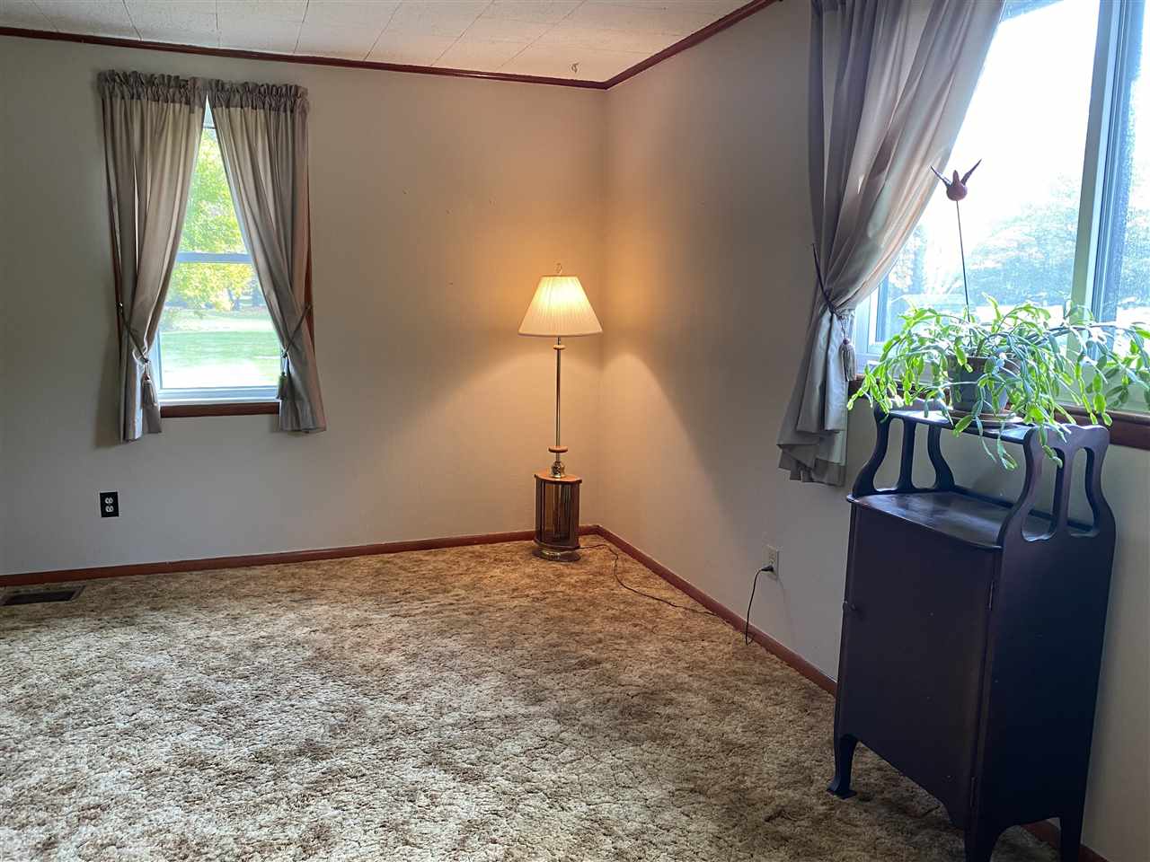 10979 2nd Street Roscoe, IL 61073 - Photo 18 of 30 a view of an empty room with a window