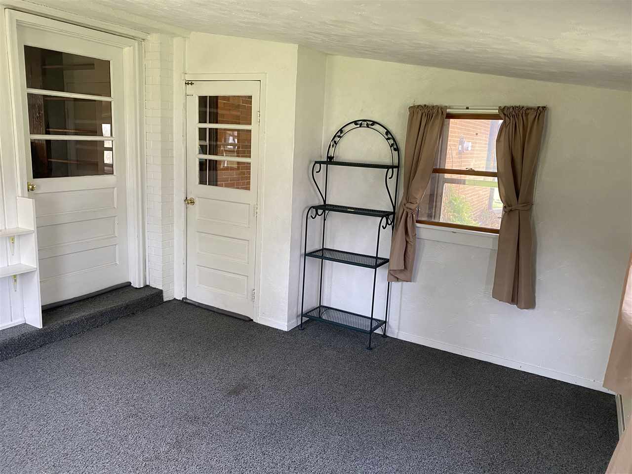 10979 2nd Street Roscoe, IL 61073 - Photo 23 of 30 a view of empty room with windows and wardrobe