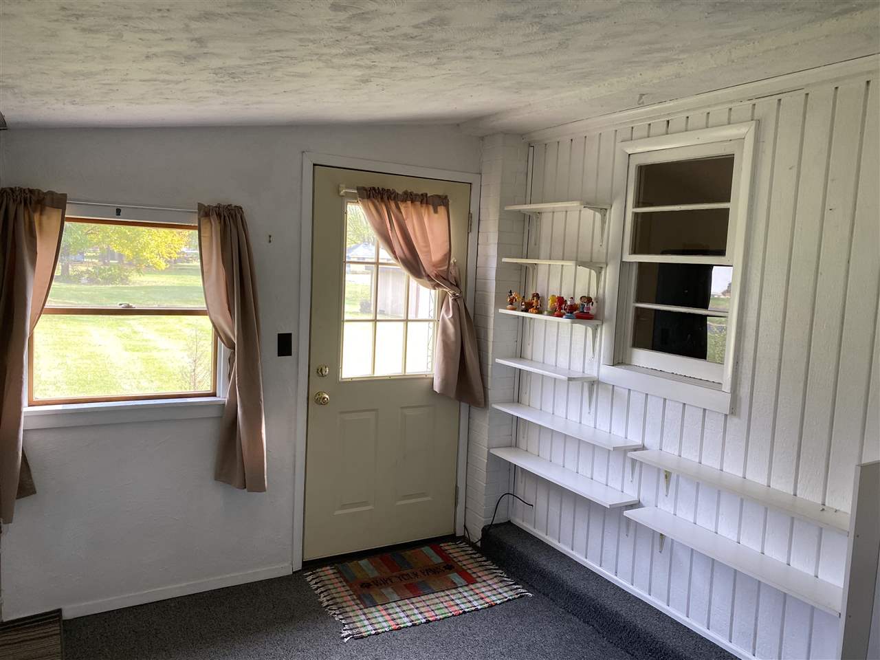 10979 2nd Street Roscoe, IL 61073 - Photo 25 of 30 a room with furniture and window