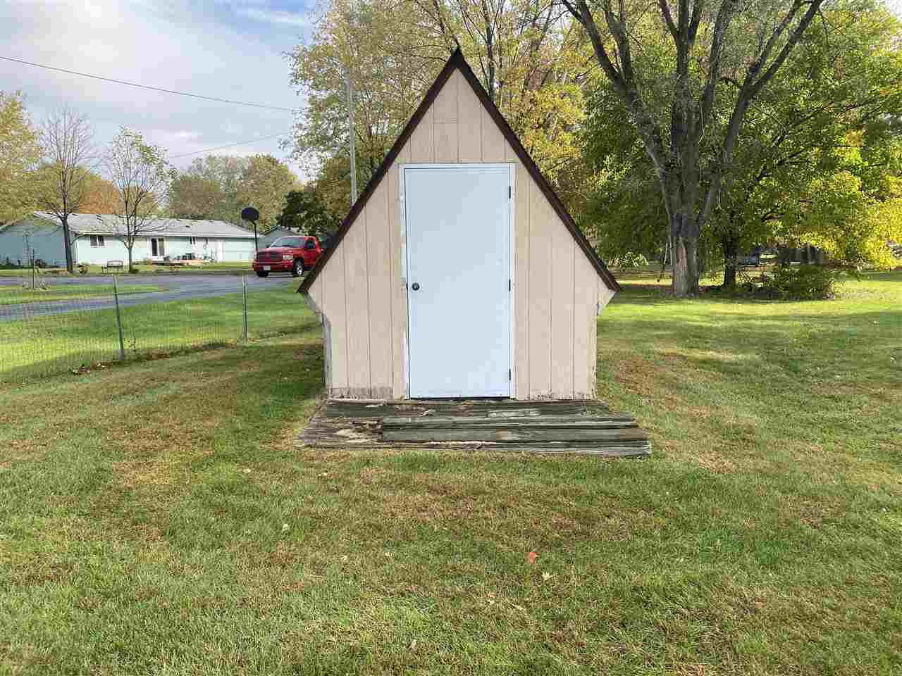 10979 2nd Street Roscoe, IL 61073 - Photo 29 of 30 a view of a house with a yard