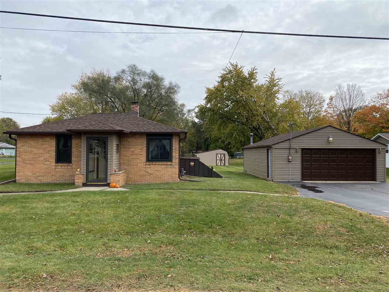 10979 2nd Street Roscoe, IL 61073 - Photo 6 of 30 a house view with a garden space