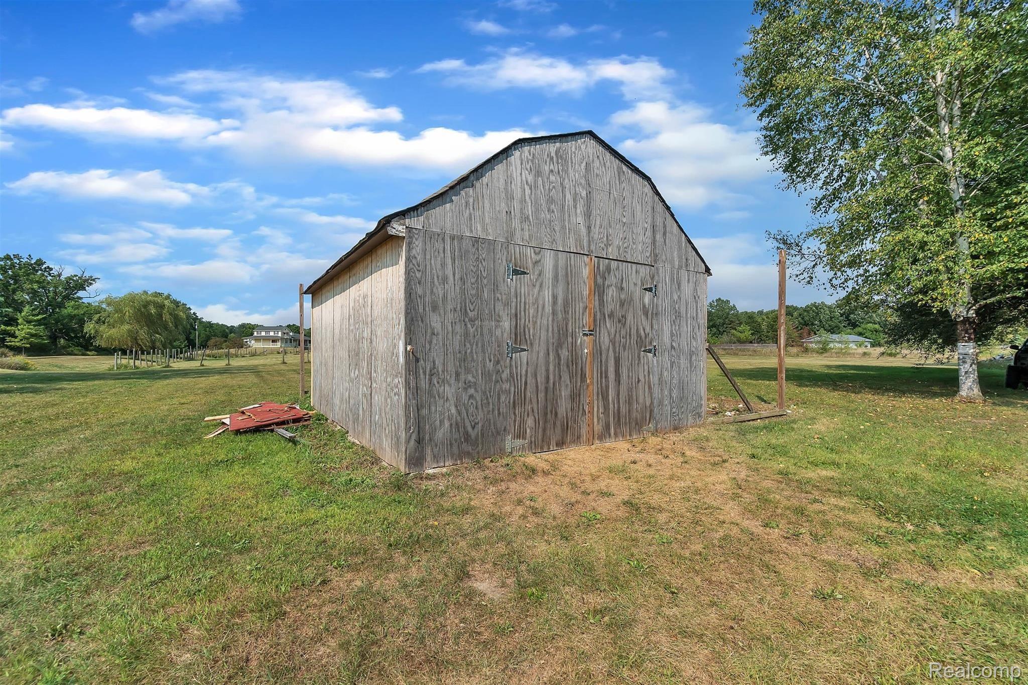 740 John Ward Howell, MI 48855 - Photo 35 of 39 35-740 John Ward-WindowStill-Real-E.jpg