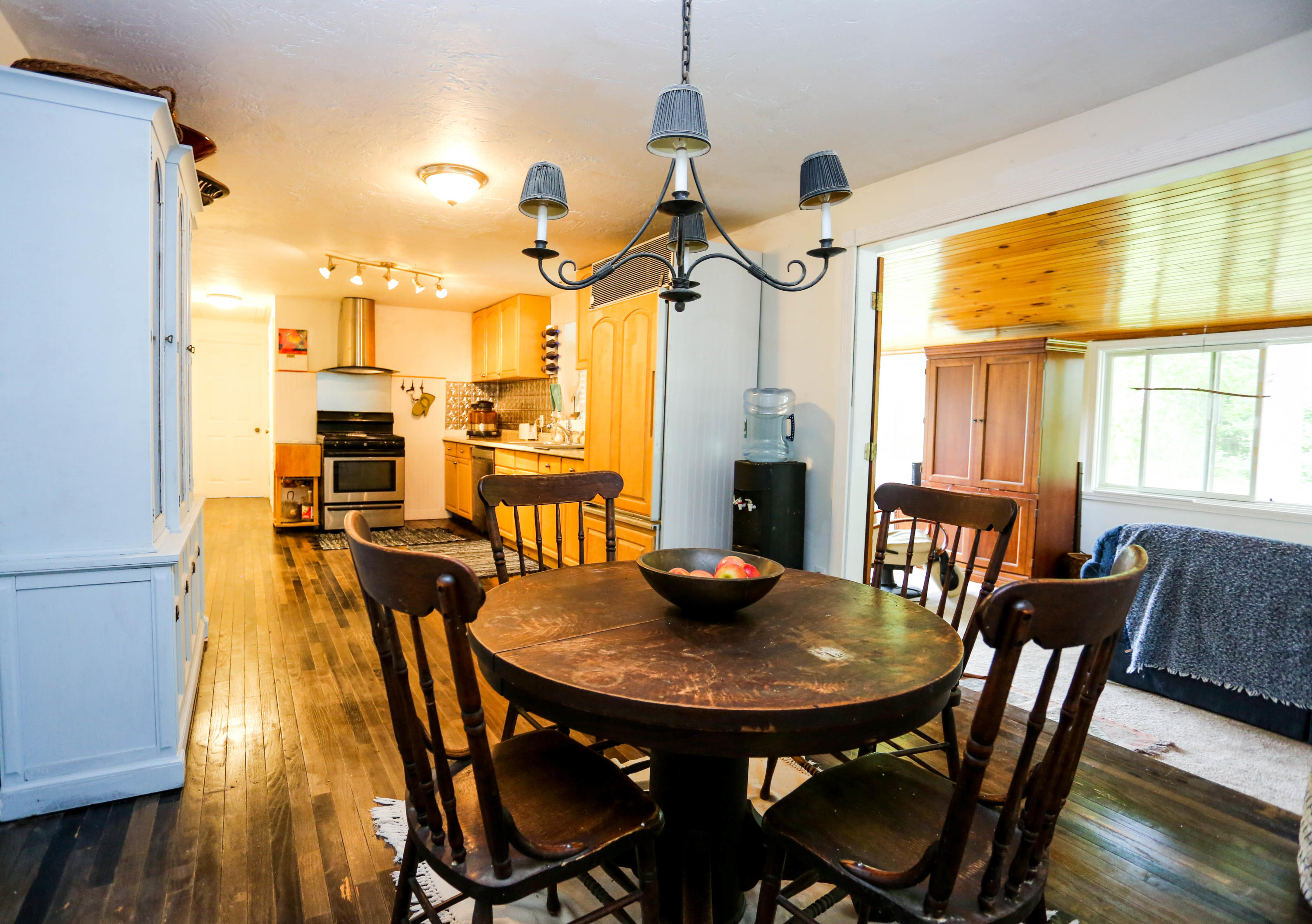 64 Crooked Pond Road Hyannis, MA 02601 - Photo 9 of 21 a view of a dining room with furniture and window