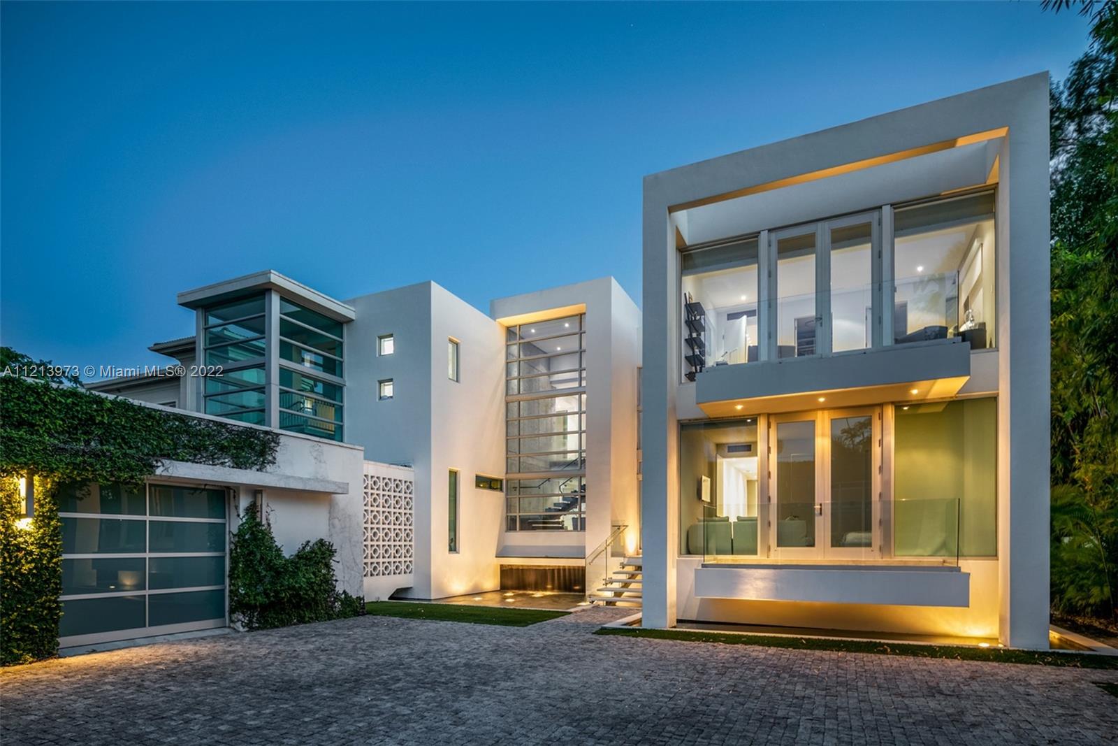 1236 Biscaya Drive Surfside, FL 33154 - Photo 5 of 40 a view of front door and small yard