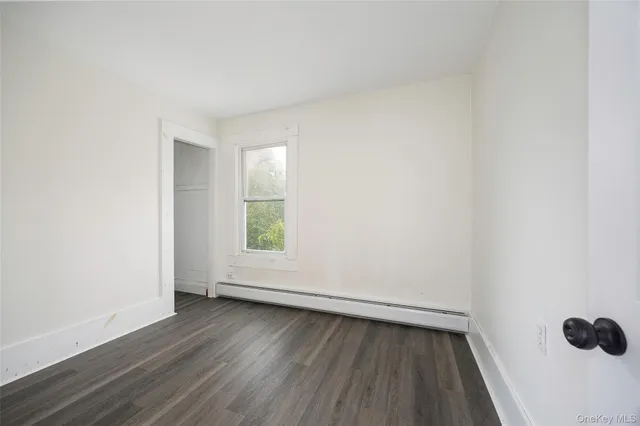 a kitchen with a stove a sink and a refrigerator