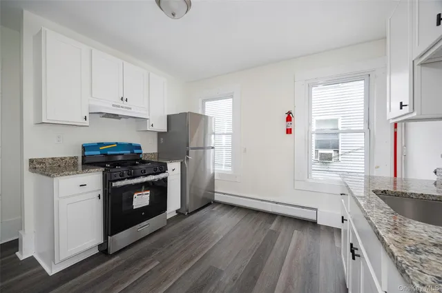 a view of kitchen and utility room