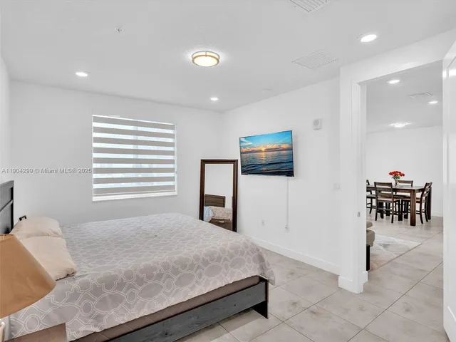 a bathroom with a double vanity sink mirror and double