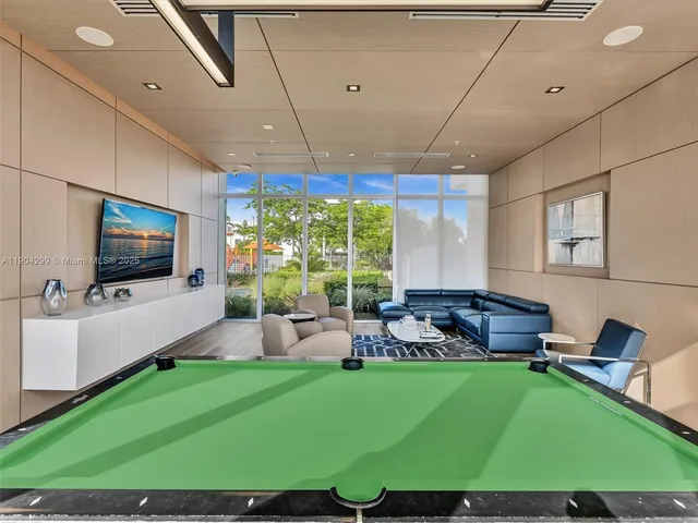 an aerial view of multiple houses with yard