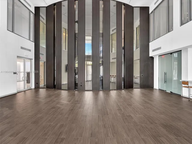 an aerial view of a residential houses with outdoor space