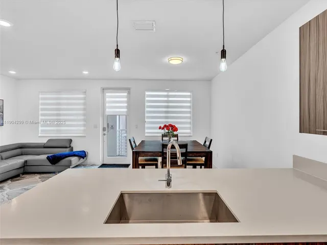 a kitchen with a large counter top space