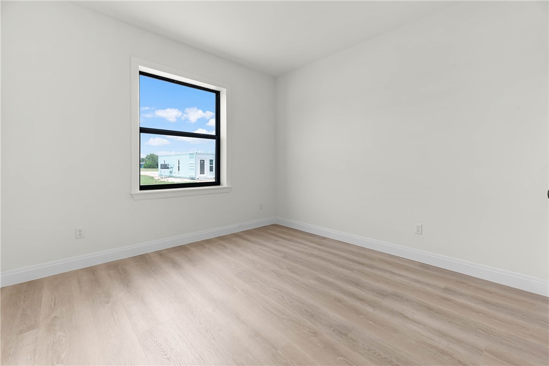 1210 West Dallas Seadrift, TX 77983 - Photo 13 of 21 an empty room with a workspace