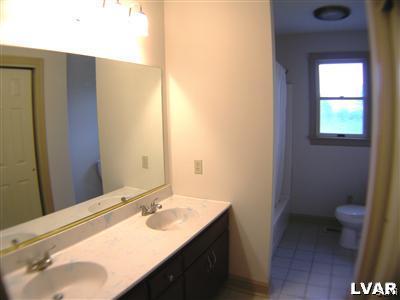 532 Roberts Road Nazareth, PA 18064 - Photo 23 of 34 a bathroom with a sink and a toilet