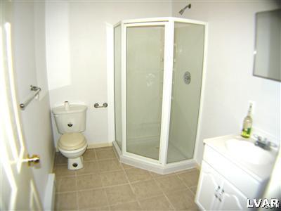 532 Roberts Road Nazareth, PA 18064 - Photo 24 of 34 a bathroom with a granite countertop shower and a toilet