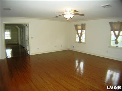 532 Roberts Road Nazareth, PA 18064 - Photo 26 of 34 a view of empty room with wooden floor and fan
