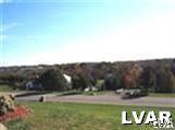 532 Roberts Road Nazareth, PA 18064 - Photo 4 of 34 a view of a yard with a lake view