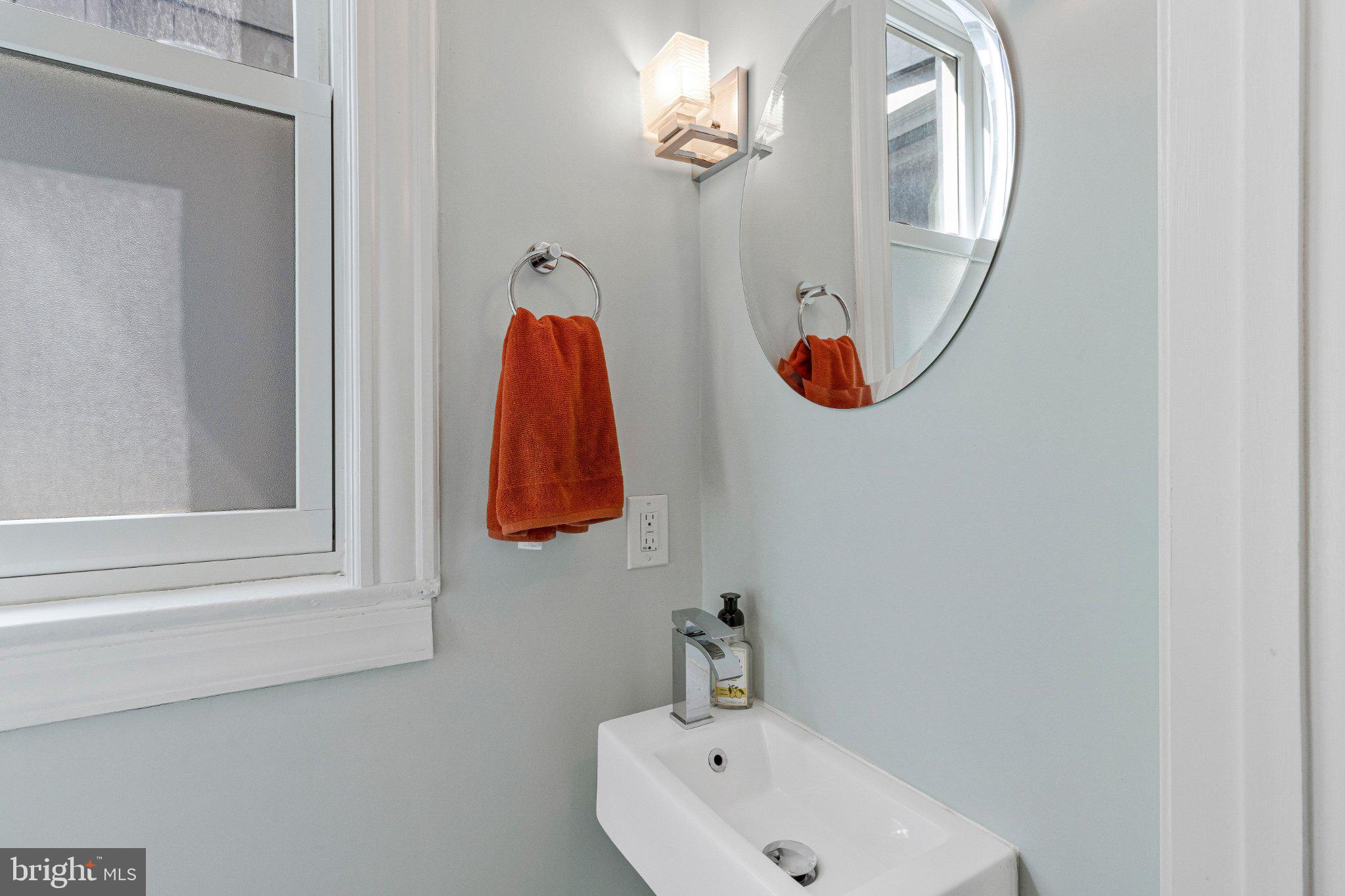 503 I Street Northeast Washington, DC 20002 - Photo 22 of 37 Sleek modern bathroom with natural light.