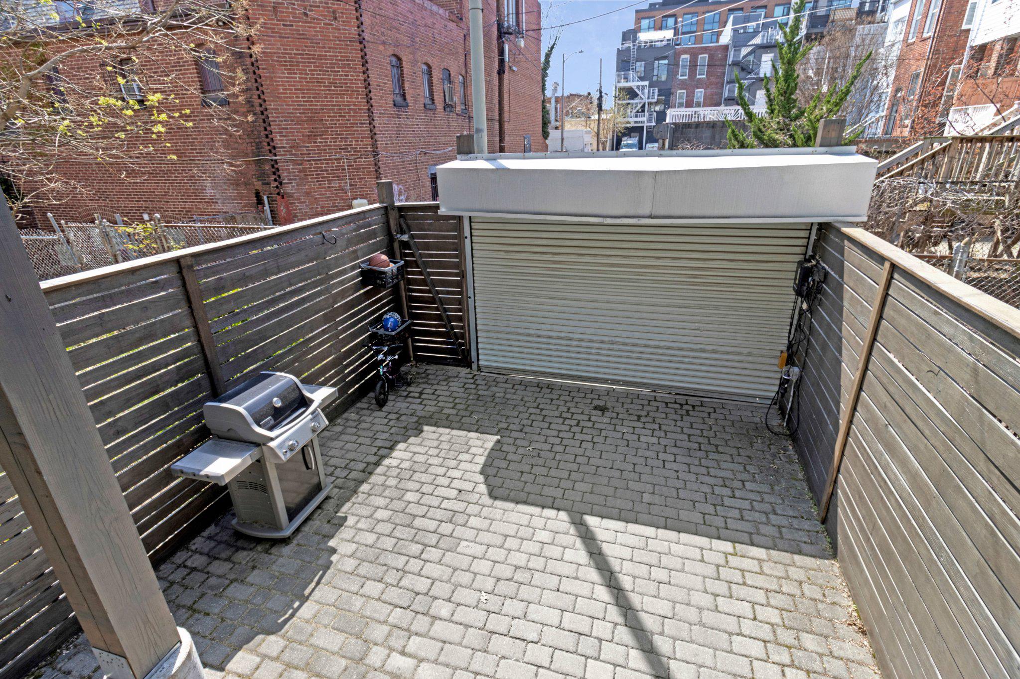 503 I Street Northeast Washington, DC 20002 - Photo 30 of 37 Secured parking and low maintenance hardscape.