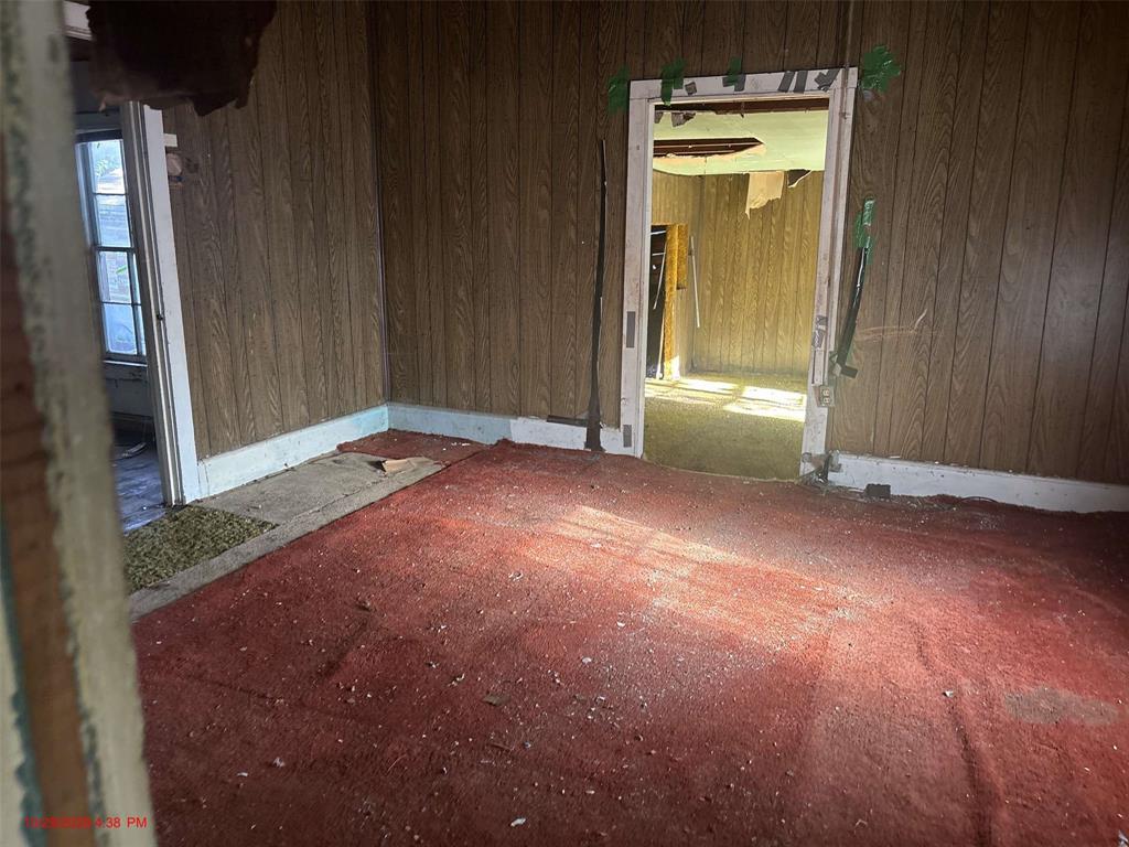 915 Turner Street Waco, TX 76704 - Photo 8 of 12 an empty room with closet and a bathroom