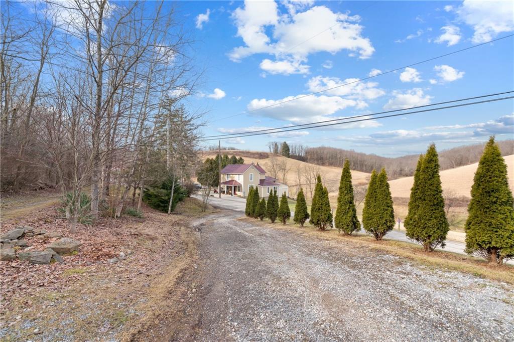 373 Taffy Run Road Rochester, PA 15074 - Photo 2 of 14 a view of a pathway with an empty space