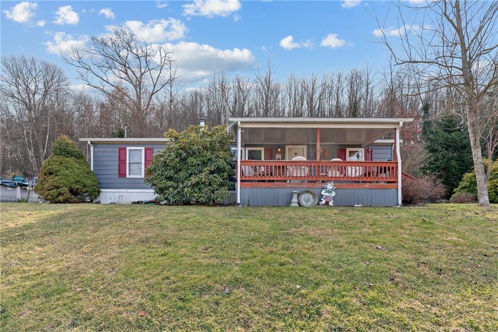 373 Taffy Run Road Rochester, PA 15074 - Photo 4 of 14 a view of a house with garden and trees