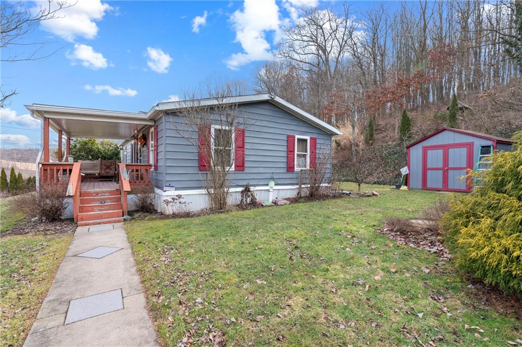373 Taffy Run Road Rochester, PA 15074 - Photo 6 of 14 a backyard of a house with seating space