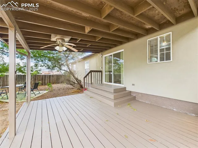 a house view with a backyard space