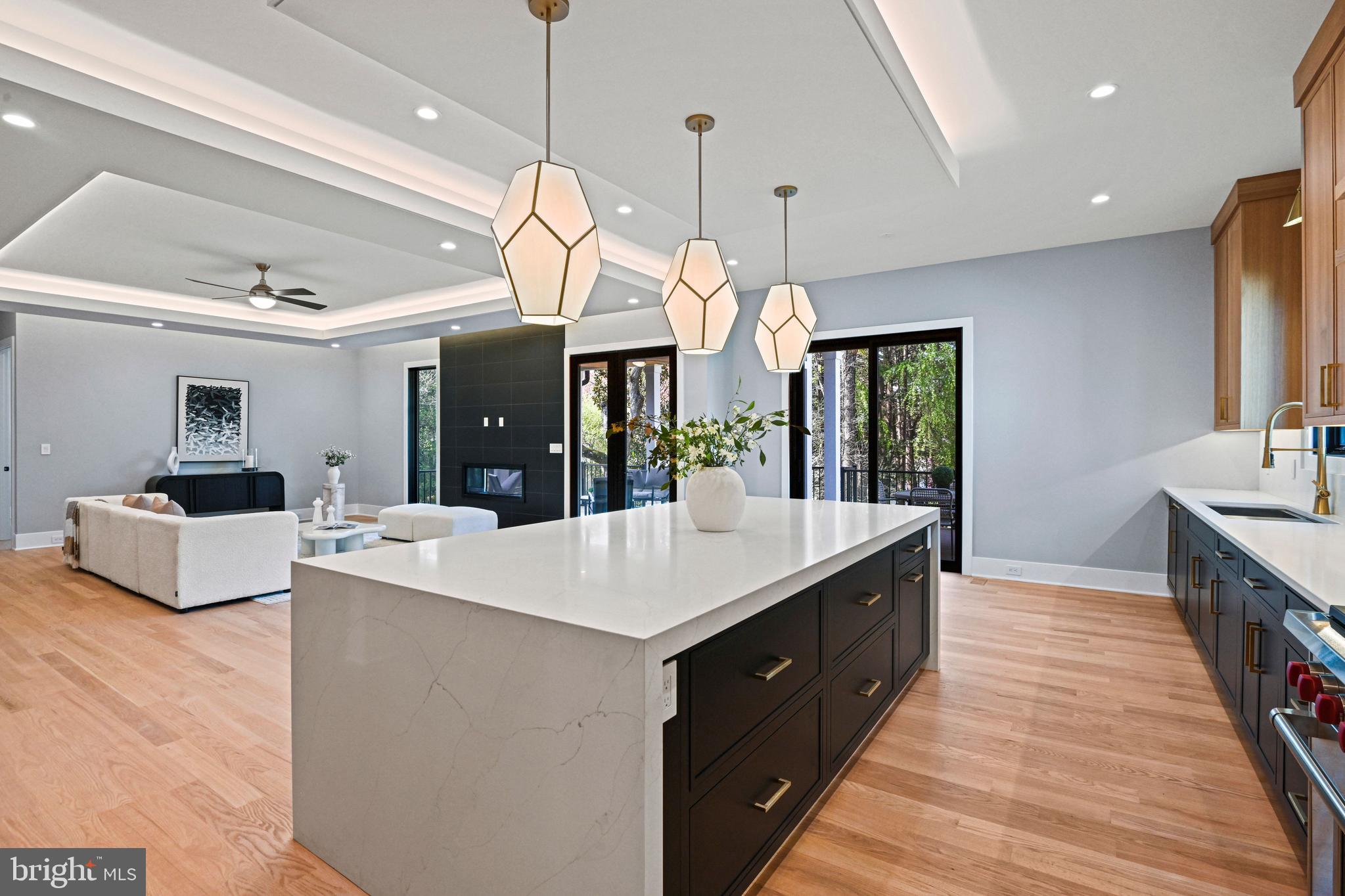 1052 Balls Hill Road McLean, VA 22101 - Photo 18 of 64 a large kitchen with kitchen island a large island in it