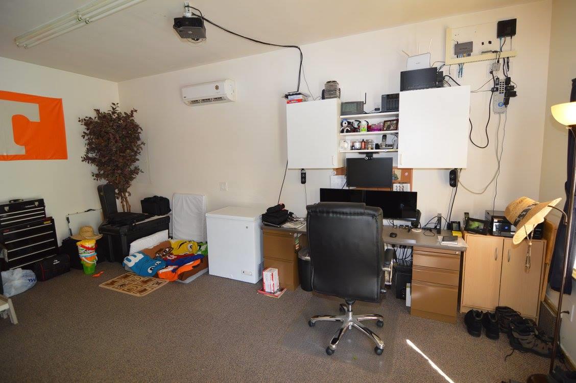 101 Bettis Road Lebanon, TN 37090 - Photo 12 of 20 a view of a workspace with furniture and a flat screen tv